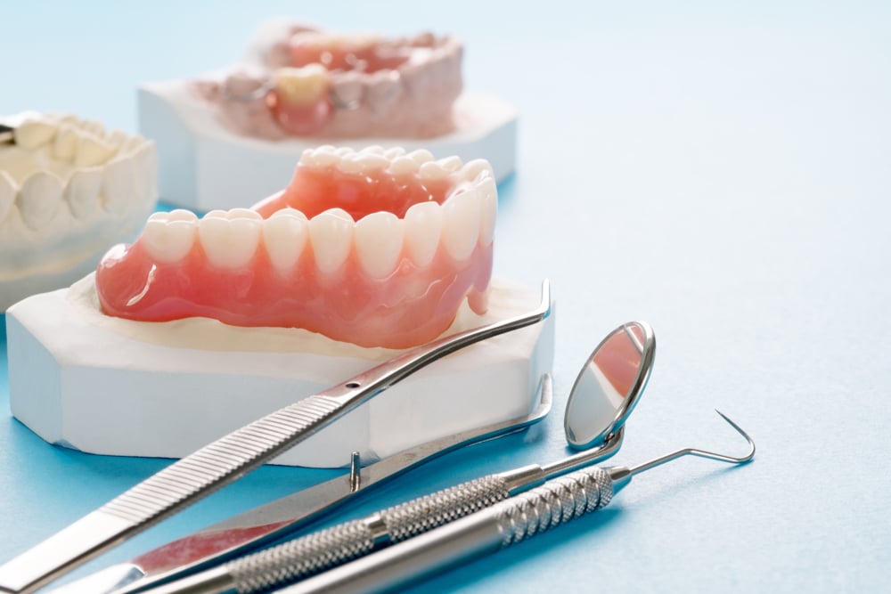 Dental Implants vs. Dentures DR. Justin Moseley. Moseley Dental Group. General, Cosmetic, Restorative, Preventative Dentistry Dentist in Dallas TX 752253